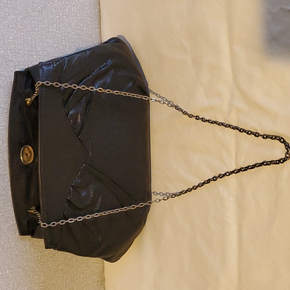 Black clutch with chain strap